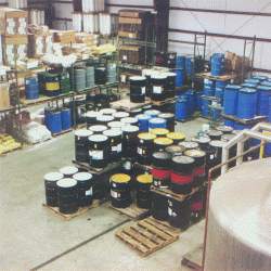Picture of pails of dye, surfactants and perfumes added to certain products
